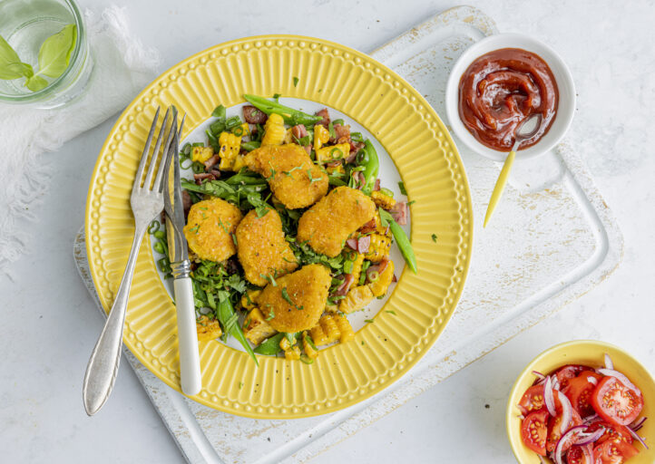 Kyllingnuggets med mais, bacon og vårløk